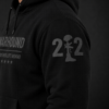 Left sleeve detail of black Warhound VMA members-only premium hoodie